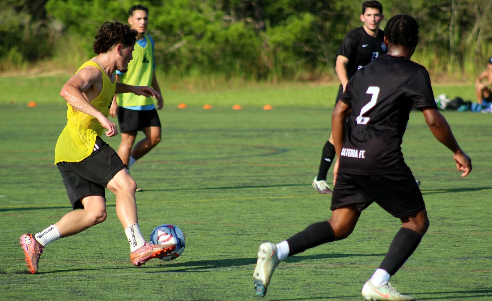 Attacker taking on a defender