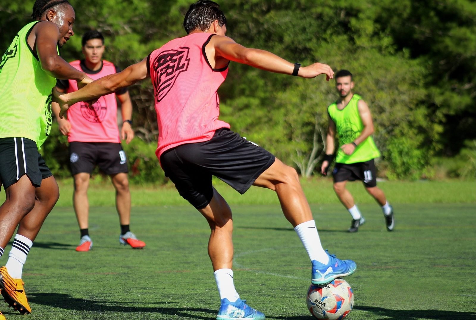 Player shielding the ball